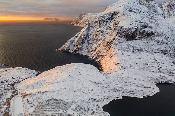 Lofoten Islands, Norway. Racks for drying codfish in the foreground
